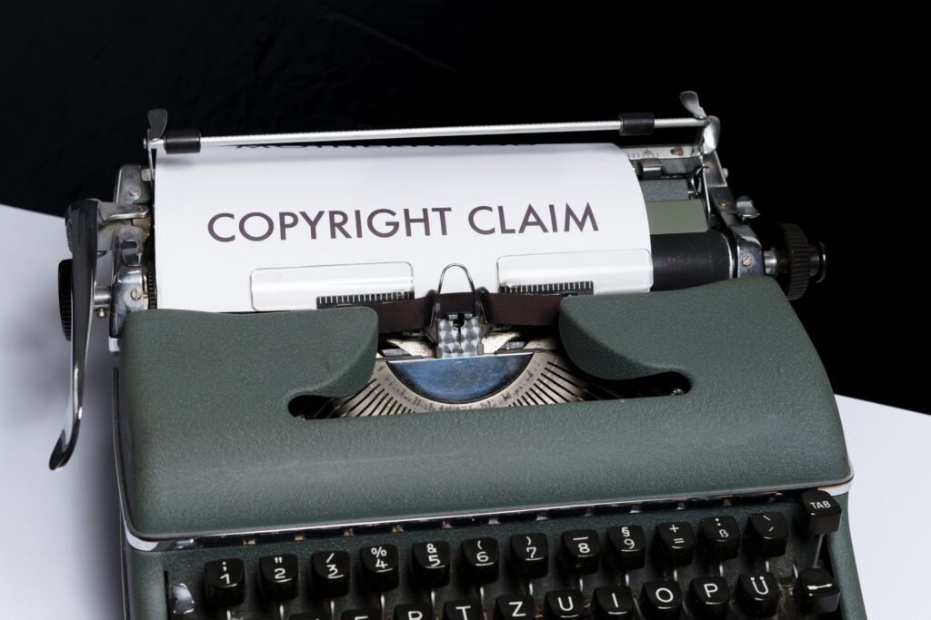 Paper in typewriter with the words copyright claim