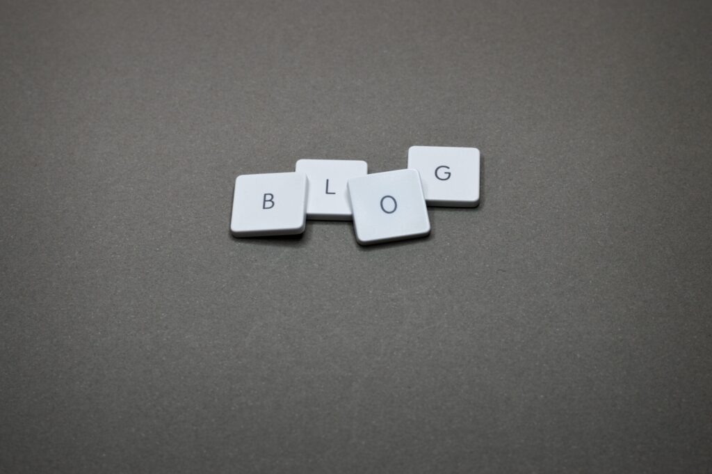 Letter tiles that spell out blog.