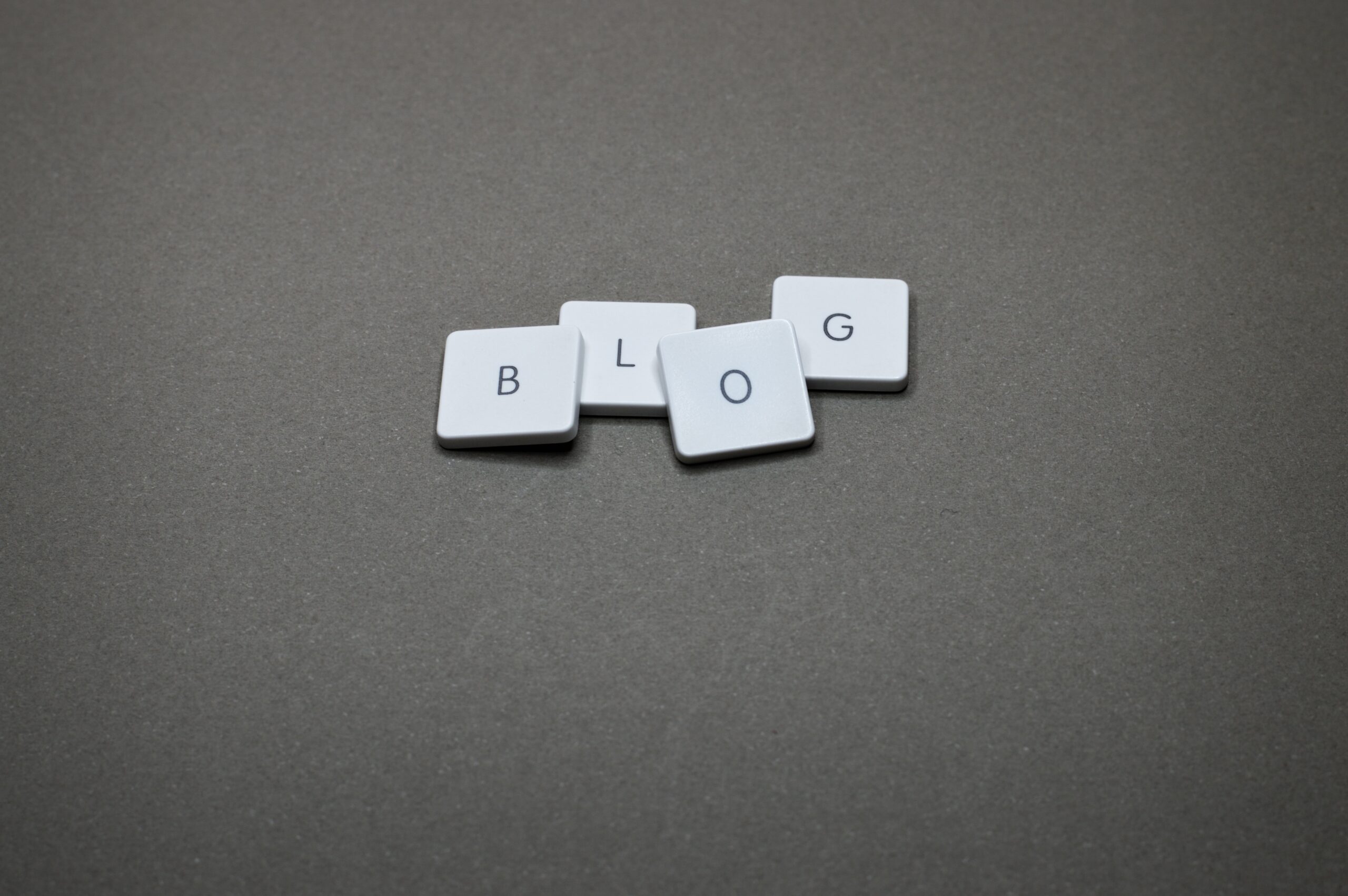 Letter tiles that spell out blog.