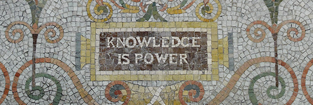Mosaic mural that reads Knowledge is Power