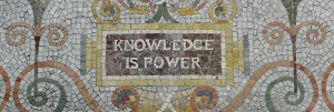 Mosaic mural that reads Knowledge is Power