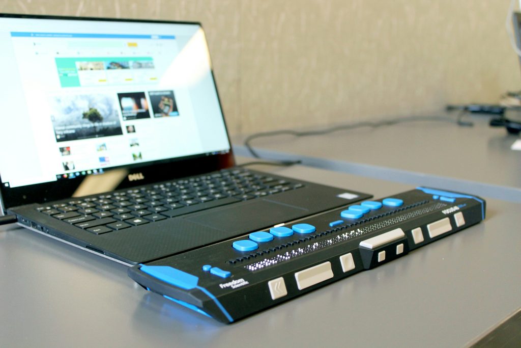 A laptop with screen reader