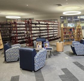 Main Floor with Book Shelves and Seating Area