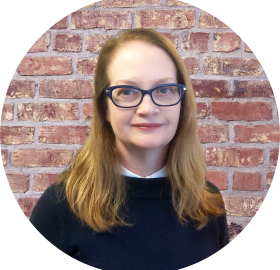 Headshot of Elizabeth Burns, Director of the Talking Book and Braille Center (TBBC)