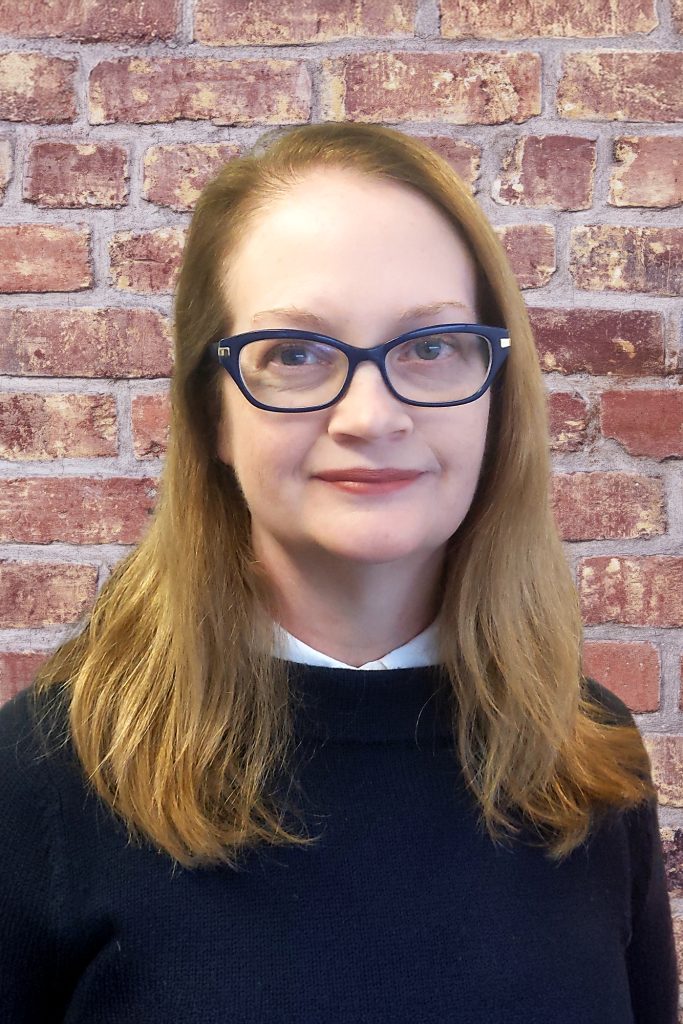Headshot of Elizabeth Burns, Director of the Talking Book and Braille Center (TBBC)